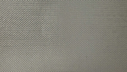 Poster - close-up texture of light gray woven synthetic mesh fabric with subtle sheen and uniform square pattern for background use in branding, print media, or web design

