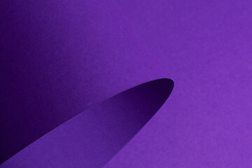 Poster - Elegant designer paper with curved and twisted shape in bright and dark violet purple tones.