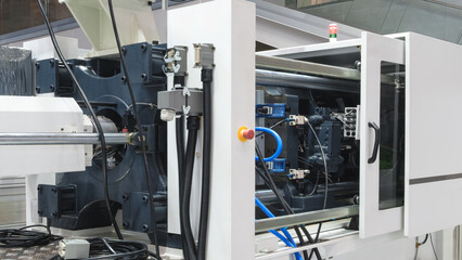 Poster - Large industrial PVC extrusion machine for producing plastic liquid canisters