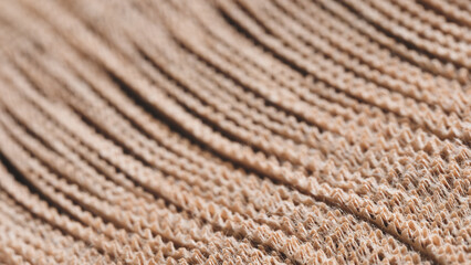 Fototapete - A long brown strip of thin sheets of kraft paper with line pattern. texture is rough and the lines are close together, creating a sense of depth and volume. scene is one of warmth