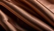 © Elara - elegant smooth brown satin fabric with rich texture and flowing drapes in color of the year 2025 mocha mousse