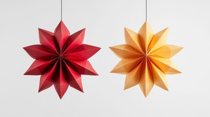Poster - Two hanging origami stars, red and gold, against a white background.