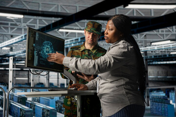 Poster - Server room army specialists reviewing AI generated insights to support operational strategies. Military server room colleagues checking mission critical systems using artificial intelligence