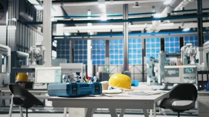 Poster - high tech manufacturing environment showing robotics in action, photovoltaic system monitoring and e