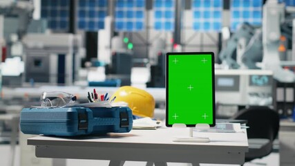 Poster - empty desk with copy space screen on laptop in a solar panels factory, manufacturing process in the 
