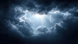© jes2uphoto - Dramatic dark stormy sky with thick clouds opening to reveal bright sunlight rays breaking through, creating powerful and moody atmosphere