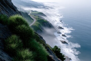 Aufkleber - Scenic coastal landscape with rugged cliffs lush green vegetation winding road ocean waves misty morning atmosphere and dramatic sky