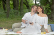 © serhii - man and woman on a picnic.man and woman relax spending time together in nature