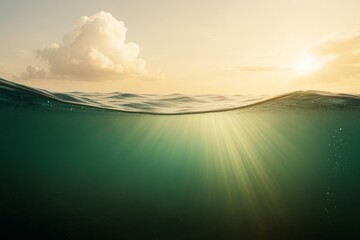 Poster - Peaceful ocean surface with sunlight rays underwater during golden hour with clouds and calm sea, perfect for nature or light-themed backgrounds.