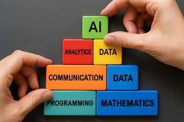 Poster - AI and Data Analytics: A Conceptual Representation of Technology and Data Science. Depicts hand arranging colorful blocks to showcase key concepts of ai, data, and related fields.