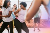 Cheerful active women in a dance class