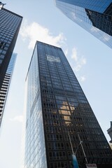 Poster - dark-glass grid office tower is standing in flat design scene with street-lamp and parking sign