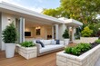 © kardaska - Modern house showcasing seamless indoor outdoor living with open doors and lush garden