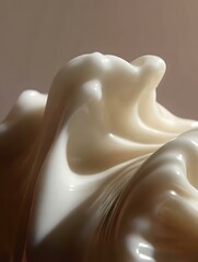 Poster - Smooth flowing curves of white cream or fabric create elegant abstract shapes against soft brown background, highlighting texture and gentle folds in minimalist style.