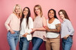 © Maria Vitkovska - Five beautiful women of different ages and ethnicities are posing together on pink background