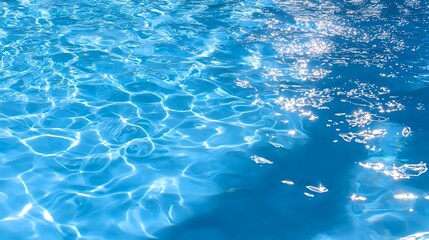 Poster - Bright sunlight reflects on rippling blue swimming pool water creating mesmerizing caustic patterns and light reflections. Serene summer aquatic background.