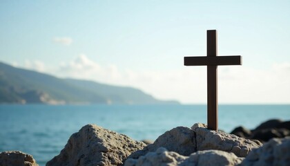 Poster - A wooden cross stands majestically on weathered rocks near the sea, with gentle waves lapping at the shore Generative AI