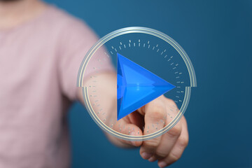 Aufkleber - Hand interacting with a futuristic play button.  Concept for digital media, technology, and user experience.