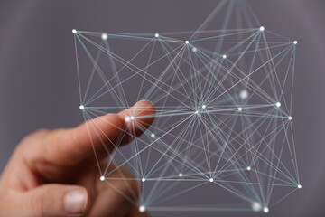 Poster - Abstract image of a hand interacting with a digital network, representing connection and data.