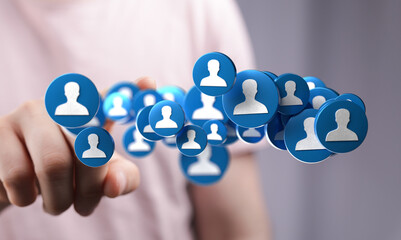 Poster - Image depicts a hand interacting with a network of social media profile icons, symbolizing connection and community building.