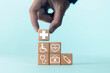 © buraporn - Health insurance concept, access to health benefits, wooden block plus icons for medicine, health care benefits, hospital business and increase in health insurance.