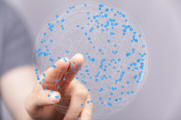 Poster - Abstract image of a hand interacting with a digital global network, representing connection and technology.