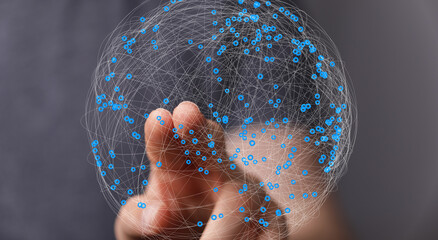 Aufkleber - Abstract image of a hand interacting with a digital network sphere. Represents connection, technology, and globalization.