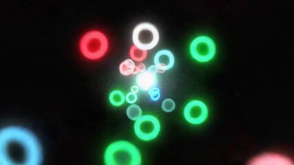 Wall Mural - abstract animation of glowing circles in various colors on a dark background