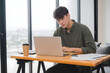 © FLGB - businessman working on laptop
