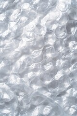 Poster - Close-up exploration of textured bubble wrap highlighting the intricate patterns of translucent plastic in a simplistic setting