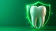 © Atmospheric stock - Glowing tooth with protective green shield on vivid green background