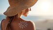 © Atmospheric stock - Young caucasian female with sun hat and sun design on shoulder enjoying beach sunset