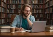 © abdelaziz@771 - Student studying in library with laptop and books preparing for exam research and education concept
