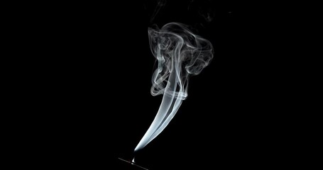 Wall Mural - Real smoke on a black background. Thin Flexible Trickle of Real Smoke. Colorful real smoke rises up. Ideal for background or over-layer with blending mode add, screen, lighten.