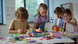 © stockbusters - Kids engaged art activity at elementary school artclass closeup. Group children