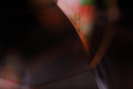 	
Red reflections of liquid in macro, red liquid surface, bubbles in macro, connection of bubbles in macro, cell from liquid, horror background