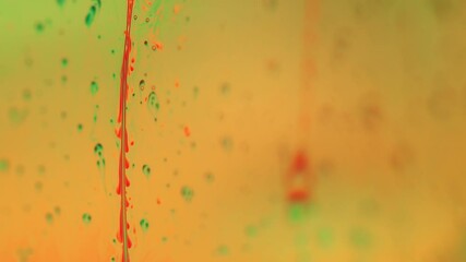 Fototapete - Yellow mustard liquid surface, falling drops, smooth motion