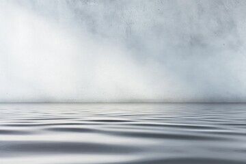 Poster - Serene Ocean Water Surface with Gentle Ripples and Calm Waves Under Overcast Sky in a Tranquil Seascape Scene