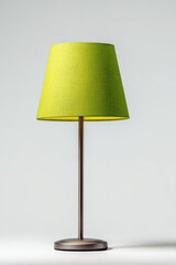 Poster - Modern vibrant lime green fabric table lamp with cylindrical drum shade and sleek metallic base on a plain white background