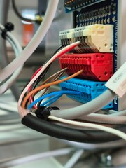 close-up of industrial electrical wiring and terminal blocks