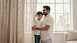 © Luna - A man and a boy standing together looking out the window, possibly contemplating or planning something