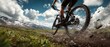 © Dovhas - The cyclist navigating a rugged mountain trail under a dramatic sky