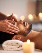© Lena - Relaxing head and face massage for stress relief in a serene spa atmosphere.