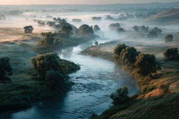 Poster - Misty early morning over a River Valley in the Countryside, the water meanders smoothly through the green fields