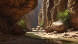 Sunlit canyon with layered sandstone walls and winding river below