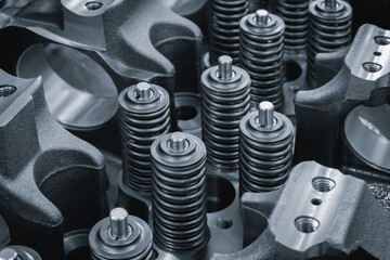 Poster - Dark blue close-up of engine valve springs. springs are black and shiny. mage has an industrial and mechanical mood, service repair car engine concept background
