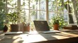 © svastix - This captivating image showcases a sunlit home office adorned with greenery, featuring a laptop and stationery, embodying the synergy of productivity and tranquility in a workspace.
