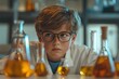 © yay - Young boy engrossed in science experiment