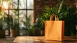 © svastix - An empty orange paper bag positioned against a backdrop of vibrant greenery, symbolizing eco-friendliness and sustainability, ideal for shopping and lifestyle themes.