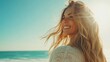 © svastix - A joyful woman with flowing hair smiles broadly as she enjoys the warmth of a sunny beach day, capturing the essence of happiness and carefree living by the ocean.